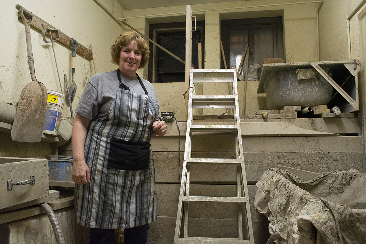Current Athabasca Pottery Club president Heather Betts shows the room where the magic begins – the basement room in the Old Brick School where the club's clay is stored and processed.